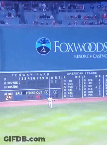 Baseball Game In Front Of Foxwoods Resort And Casino Sign GIF