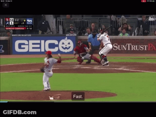 Baseball Game In Front Of Geico Banner GIF