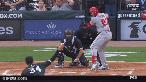 Baseball Game In Front Of Grand Victoria Banner GIF