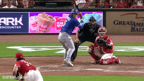 Baseball Game In Front Of Greatame Ball Sign GIF