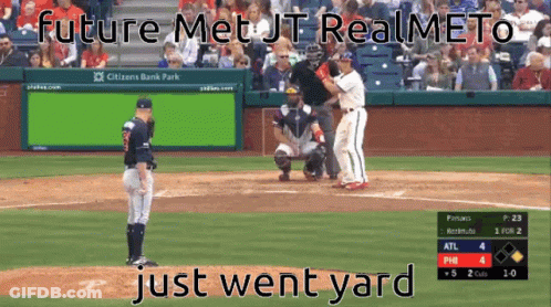 Baseball Game In Front Of Green Screen Saying Future Met JT Realmeto Just Went Yard GIF