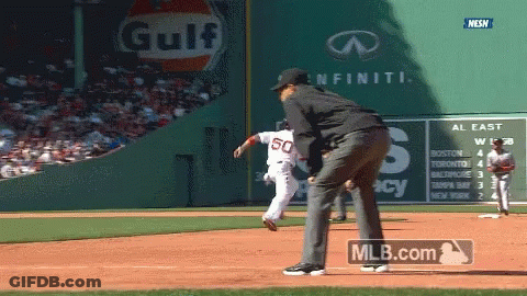 Baseball Game In Front Of Gulf Ad GIF