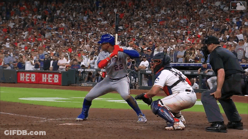 Baseball Game In Front Of H-E-B Banner GIF