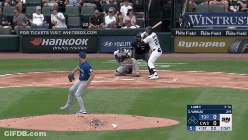 Baseball Game In Front Of Hankook Ad GIF