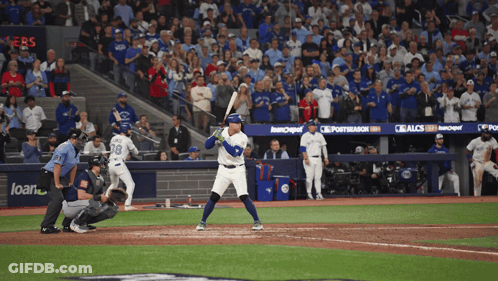 Baseball Game In Front Of Loan Banner GIF