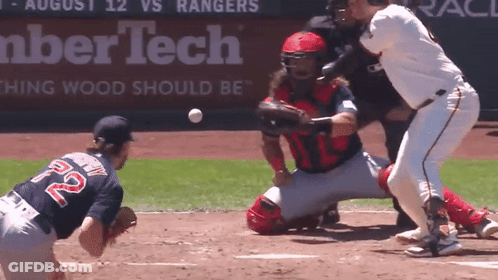 Baseball Game In Front Of Lumbertech Sign GIF