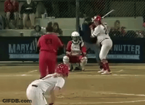 Baseball Game In Front Of Mary Nutter Banner GIF