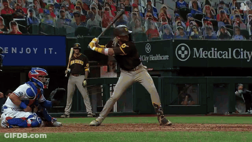 Baseball Game In Front Of Medical City Healthcare Sign GIF