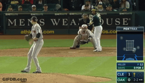 Baseball Game In Front Of Men's Wearhouse Ad GIF