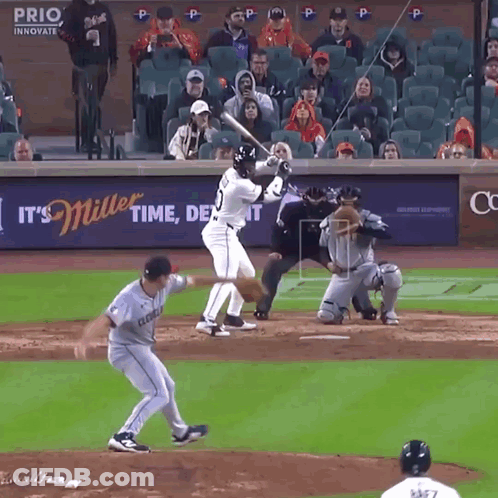 Baseball Game In Front Of Miller Beer Ad GIF