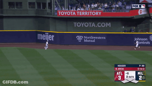 Baseball Game In Front Of Mutual Ad GIF