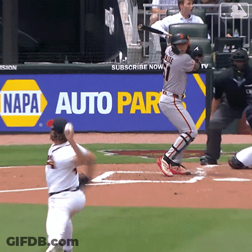 Baseball Game In Front Of Napa Ad GIF