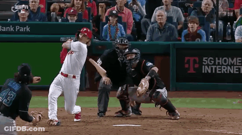 Baseball Game In Front Of T-Mobile Ad GIF