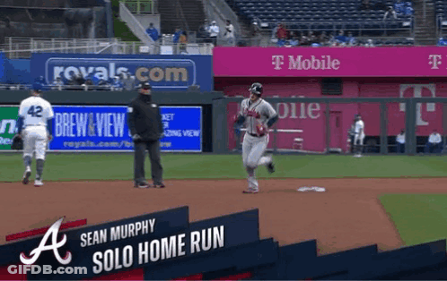 Baseball Game In Front Of T-Mobile Banner GIF