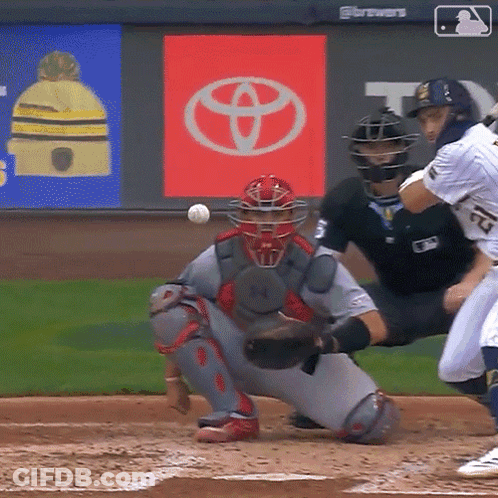 Baseball Game In Front Of Toyota Ads GIF
