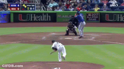 Baseball Game In Front Of UHealth Ad GIF