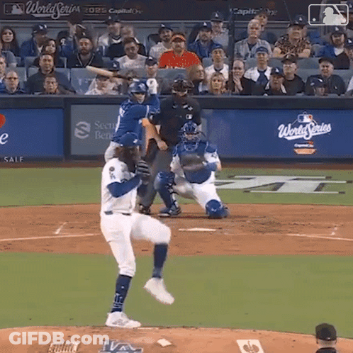 Baseball Game In Front Of World Series Sign GIF