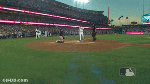 Baseball Game In Stadium With Scoreboard GIF