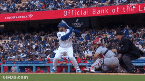 Baseball Player Batting With Bank Of America Banner GIF