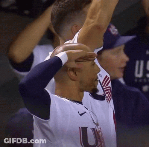 Baseball Player Covering Eyes GIF
