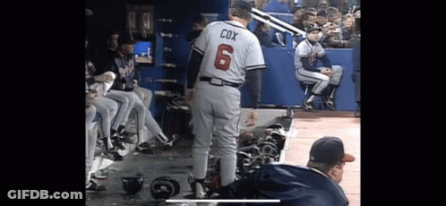 Baseball Player Cox Standing In Dugout GIF
