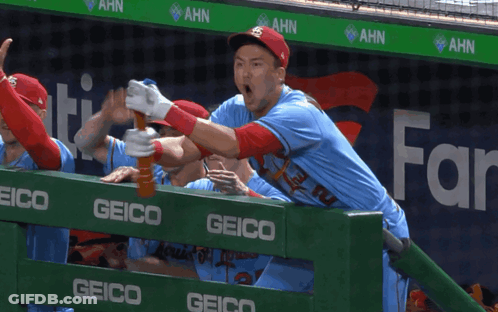 Baseball Player Holding Bat GIF