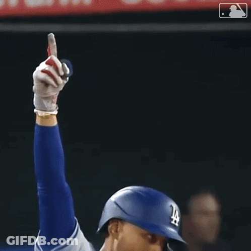 Baseball Player Holding Glove In Dodgers Helmet GIF