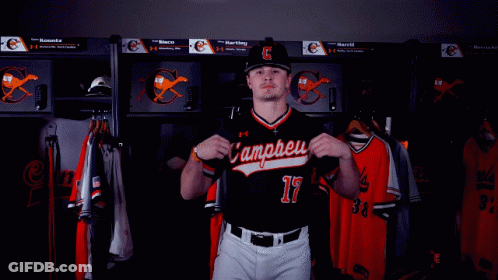 Baseball Player In Black And Orange Uniform GIF