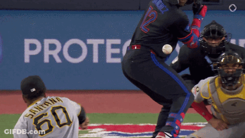 Baseball Player In Black Jersey Number 12 GIF