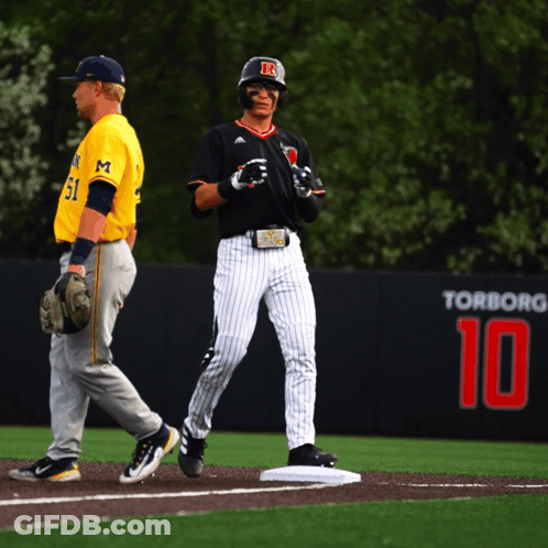 Baseball Player In Black Jersey With Letter R GIF