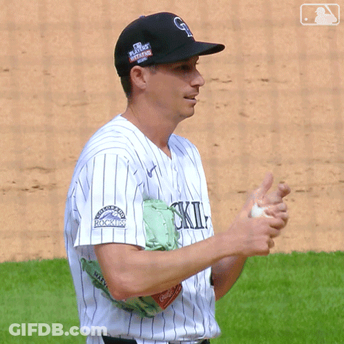 Baseball Player In Black Rockies Hat GIF