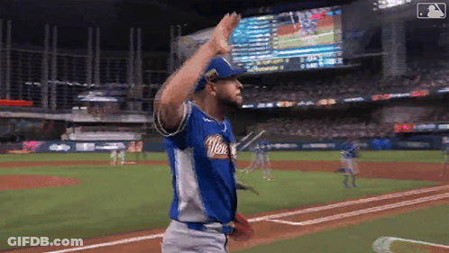 Baseball Player In Blue And White Texas Jersey GIF
