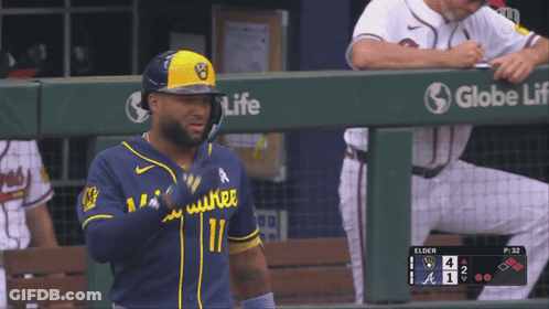 Baseball Player In Blue And Yellow Uniform Number 11 GIF