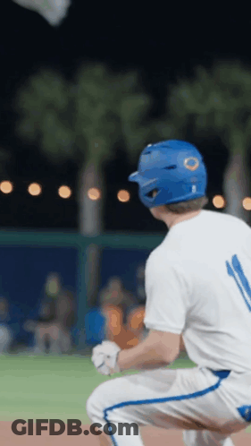 Baseball Player In Blue Helmet Number 11 GIF