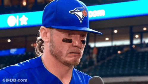 Baseball Player In Blue Jays Hat Talking Into Microphone GIF