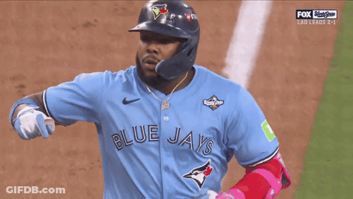 Baseball Player In Blue Jays Jersey Pointing GIF