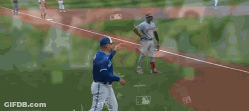 Baseball Player In Blue Jays Uniform Talking To Referee GIF