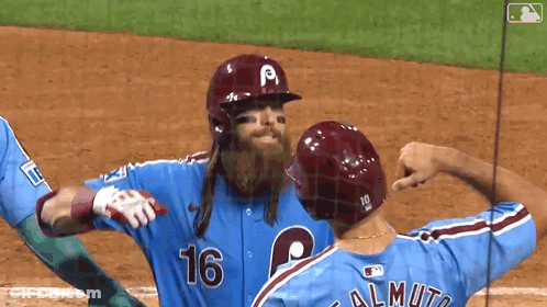 Baseball Player In Blue Jersey Number 16 GIF