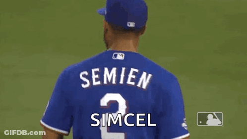 Baseball Player In Blue Jersey Number 2 GIF