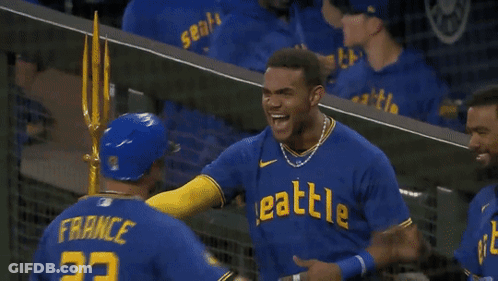 Baseball Player In Blue Jersey Number 23 GIF