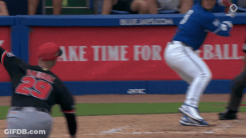 Baseball Player In Blue Jersey Number 29 GIF