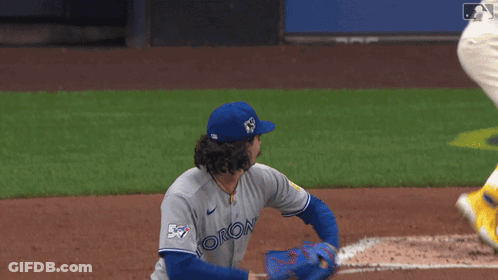 Baseball Player In Blue Jersey Number 5 GIF
