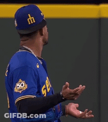 Baseball Player In Blue Jersey Number 50 GIF