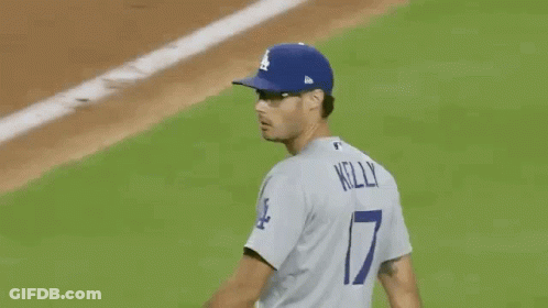 Baseball Player In Blue Jersey Number 7 GIF
