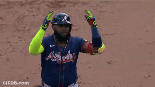 Baseball Player In Blue Jersey Shaking Hands GIF