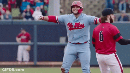 Baseball Player In Blue Ole Miss Jersey Next To Player In Red Jersey Number 6 GIF
