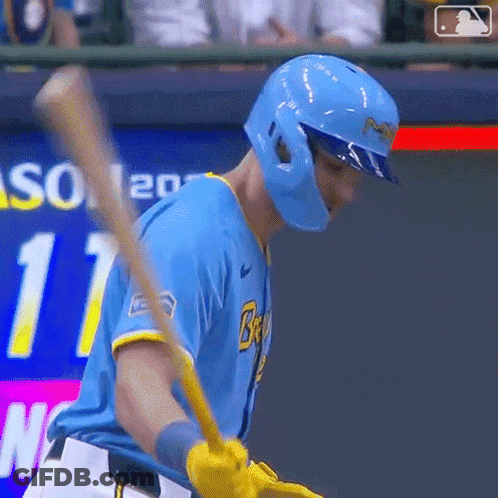 Baseball Player In Blue Uniform Swinging Bat GIF