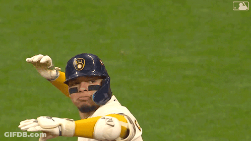Baseball Player In Brewers Jersey Standing On Field GIF