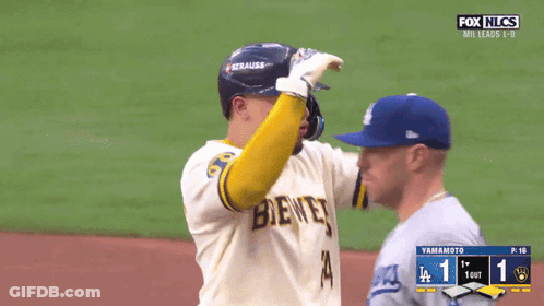 Baseball Player In Brewers Jersey Talking To Another GIF