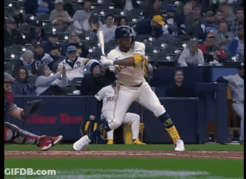 Baseball Player In Brewers Uniform Swinging At Pitch GIF